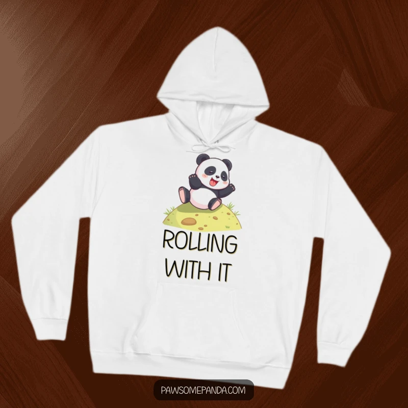 Funny panda rolling down a hill on a cozy hoodie, perfect for spreading cheerful humor.