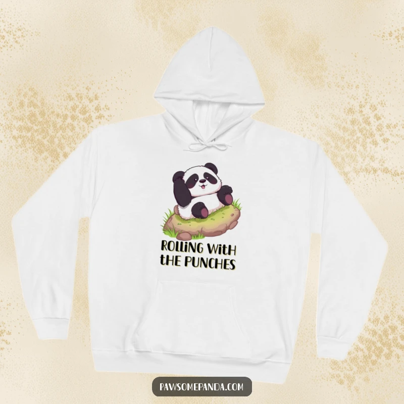 Funny hoodie showcasing a curious panda rolling exuberantly down a grassy hill, a symbol of playful freedom and joy.