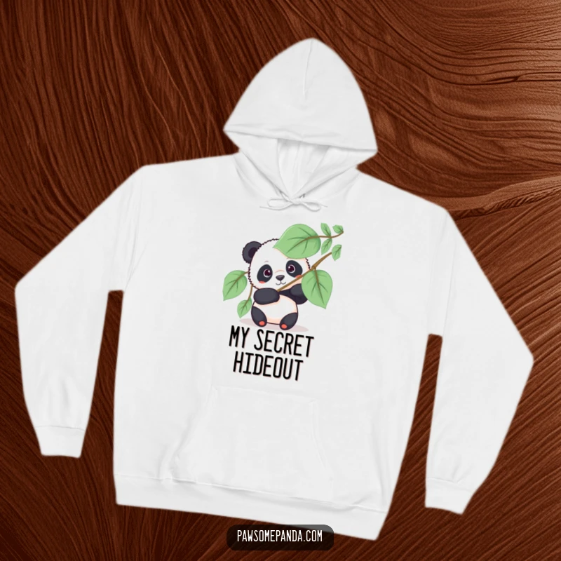 Funny panda hoodie featuring a curious panda bear peeking from behind a large fan, a warm and humorous design.