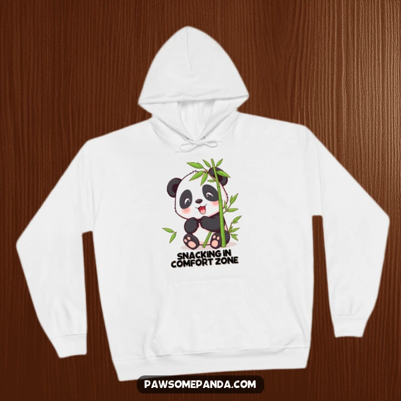 Funny hoodie print of a content panda character peacefully munching on bamboo, offering cozy warmth and cute vibes.