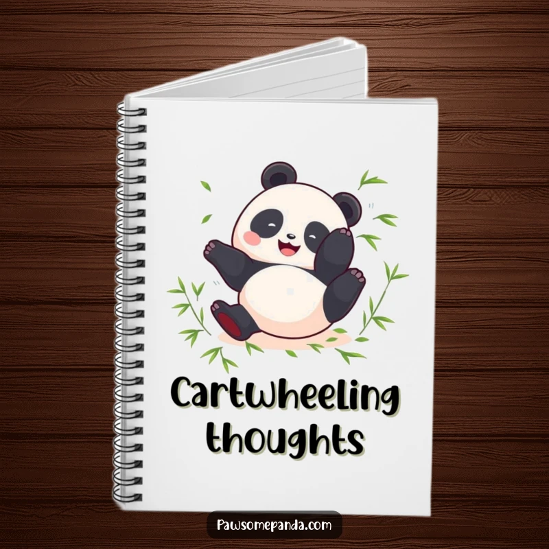 Funny notebook featuring a round panda doing a happy somersault with bamboo leaves, perfect for journaling.