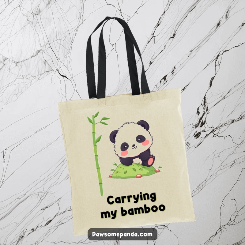 Funny panda tote bag showing a fluffy character comically tumbling down a small hill of bamboo shoots, great for shopping.
